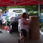 Cindy and Sam get the raffle prizes all loaded up and ready.
