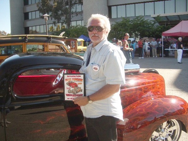Mike shows off the award the MPM car club donated for best engine.