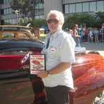 Mike shows off the award the MPM car club donated for best engine.