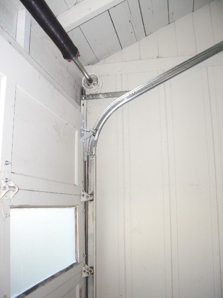 Roof pitch track conversion and Liftmaster 3800 opener install.