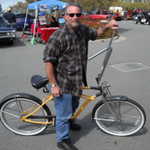 Bad ass biker Tony Lamberti brings out his scooter. Now all he needs is some playing cards in the spokes!