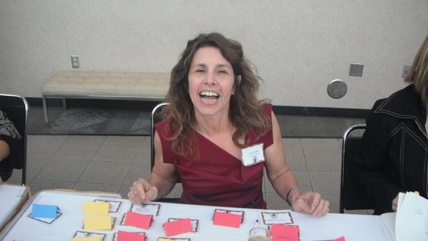 Sue helps us get our name tags and seats.
