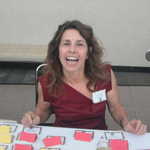 Sue helps us get our name tags and seats.