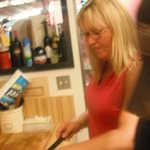Kim is handy with the knife and cuts the sausage like a pro.