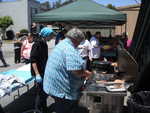 Eddie lends a hand with the BBQ duties.