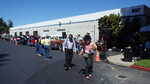 They are either line dancing or looking for dropped change?
