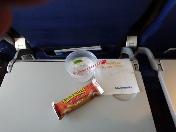 Breakfast of champions = gin and tonic and a salty peanut bar.