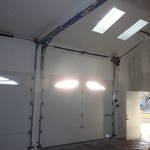 Highlight for Album: High lift and roof pitch garage door install.