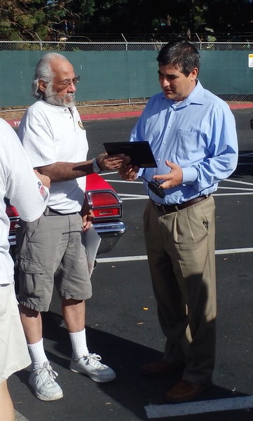 Carl presents a thank you plaque to the man who makes this all possible.