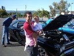 My wife's cousin and his sone stopped by to admire the cars. I think they liked my roadrunner best. :^)
Stu
