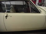 Door -  Passenger side.
Trim and handle removed.