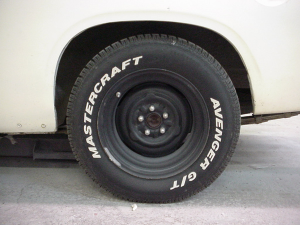Wheel-Well Left Rear. White is high-fill primer. Trim is removed. No rust!