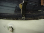 Windshield Lower Left Drain-hole!
Pocket knife to show location.