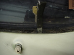 Windshield Lower Left Drain-hole!
Pocket knife to show location.