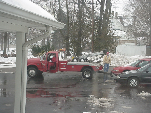 Don's wrecker delivering another on this snowy January day.