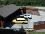 The lower portion of the house, four garages and a carport